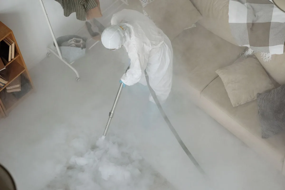 Biohazard cleanup technician in protective equipment, Merrick, NY